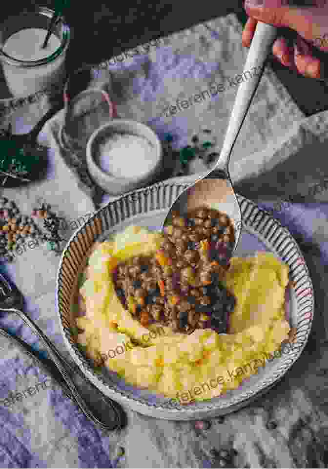 A Hearty And Comforting Dish Featuring A Layer Of Creamy Lentils Topped With A Layer Of Mashed Potatoes, Baked To Perfection Tiny But Mighty Lentil Recipes